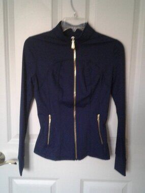 Uncia active navy gold zipper jacket size  s NWT